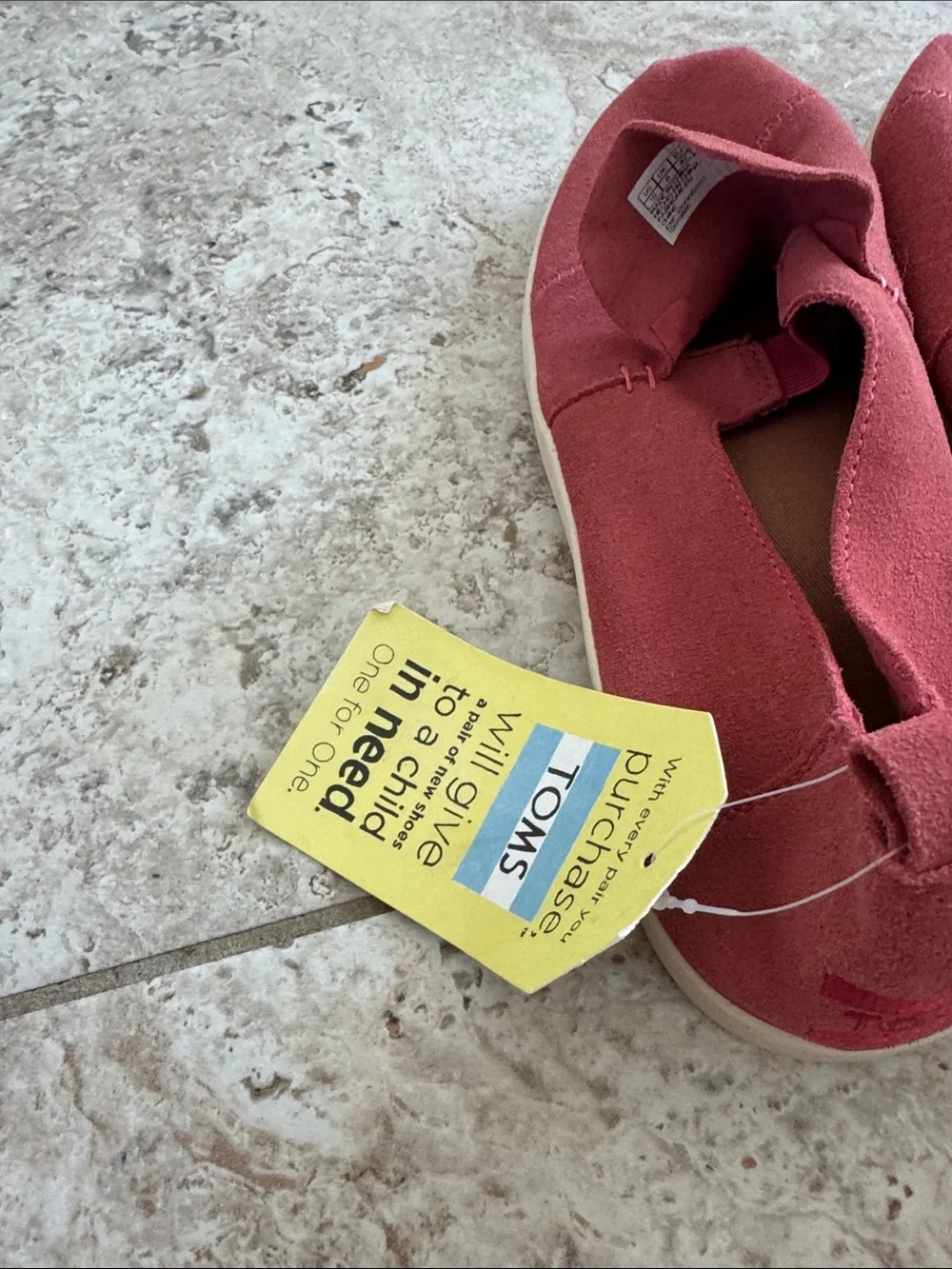 TOMS Women's Slip on sneaker style in Rust colored Red Suede
